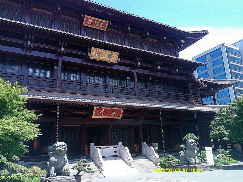 a large temple hall with stone lions
