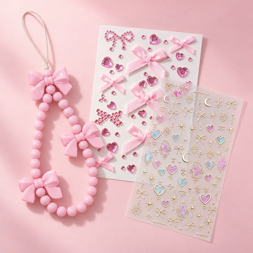 a pink bow beaded strap and two sticker sheets laid flat