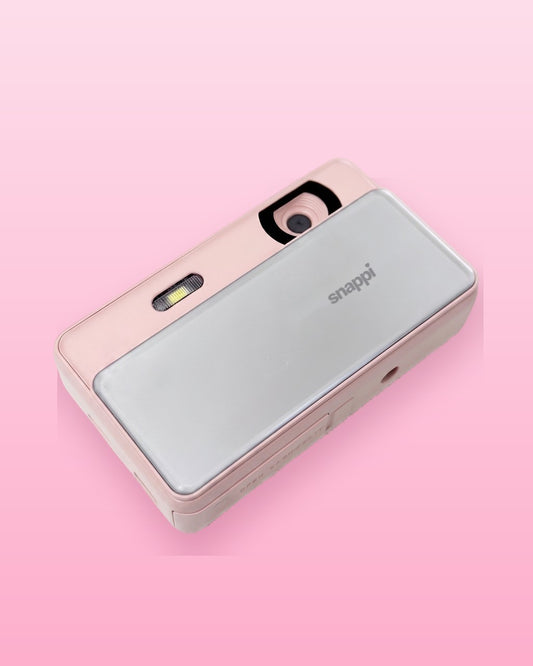 a pink slide camera, front view