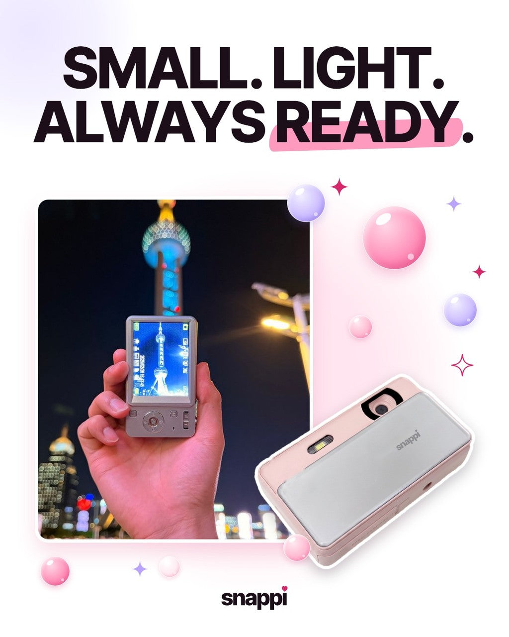 a hand holding the pink slide camera with the words small, light, always ready